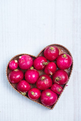 fresh radish  in heart shape