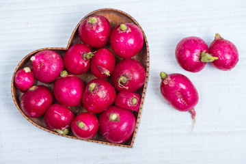fresh radish  in heart shape
