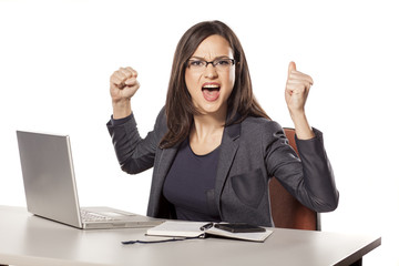 happy young businesswoman with the winning gesture