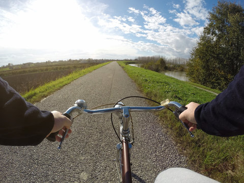 Fototapeta Bicycle on city street in the country in the autumn day