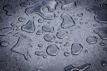 Fototapeta na wymiar Water drop on tile floor