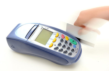 EFTPOS machine with a credit card being swiped.