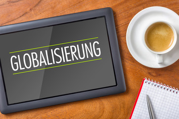 Tablet auf Schreibtisch - Globalisierung
