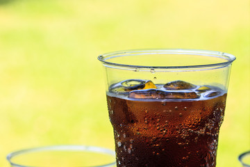 cola with ice in cup