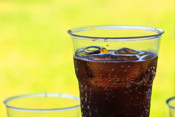 cola with ice in cup