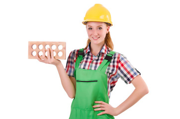 Woman with bricks isolated on white