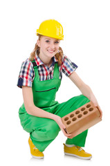 Woman with bricks isolated on white