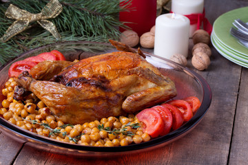 Roasted Christmas whole chicken with chickpeas