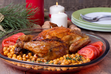 Roasted Christmas whole chicken with chickpeas