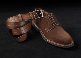 leather belt and suede shoe