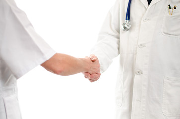 Doctor and nurse shaking hands