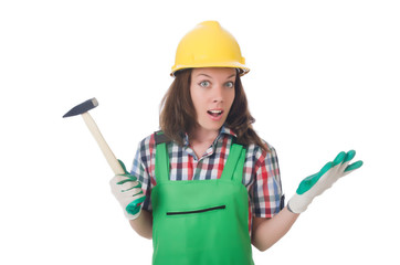 Young woman with hammer on white