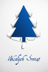 Niebieska kartka świąteczna z choinką wydartą z papieru