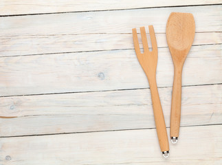Kitchen utensil over wooden table
