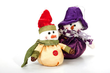 Two Smiling Warmly-Dressed Snowmen as Christmas Decorations