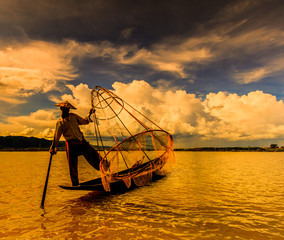 Myanmar fisherman with traditional style at Inle lake