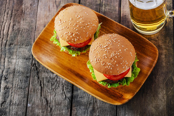 mini hamburger with cheese and tomato