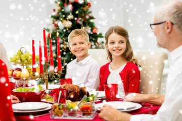 smiling family having holiday dinner at home