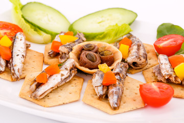 Fish on crackers