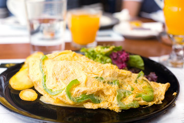 Breakfast with vegetarian omelet