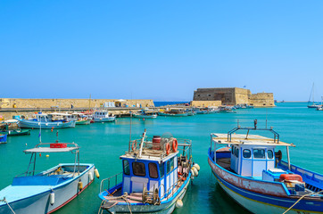 Fototapeta na wymiar Boats in the old port of Heraklion, Crete island