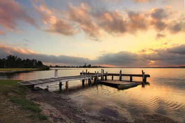 Fototapeta na wymiar Sunset at Squids Ink Jetty, Belmont on Lake Macquarie.
