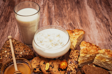 tasty breakfast with curd, pie and tea 