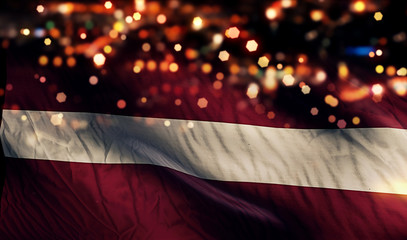 Latvia National Flag Light Night Bokeh Abstract Background - obrazy, fototapety, plakaty