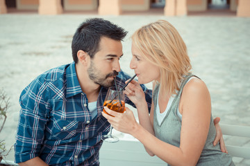 couple drinking aperitif in a Bar