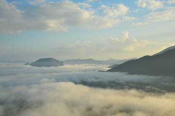 Mountain Landscape in the Mist at Sunrise