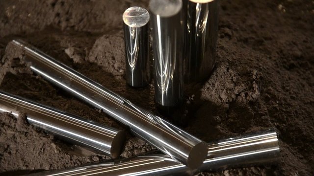 steel bars rotating over black background