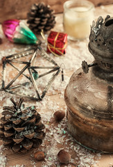 old-fashioned kerosene lamp,Christmas toys,pine cones