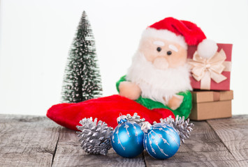 Christmas baubles and Santa Claus toy background