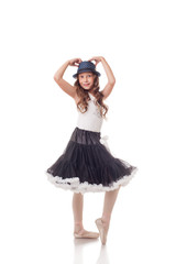 Expressive young ballerina isolated on white