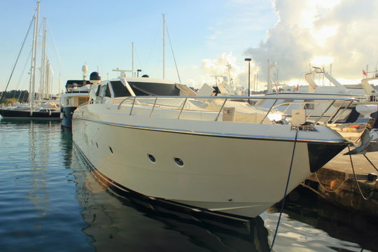 High performance power motor boat in marina