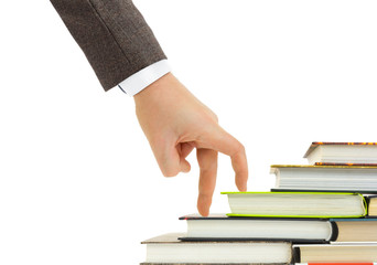 Hand and book stairs
