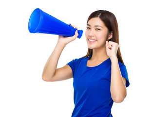 Naklejka premium Young Woman yell with megaphone