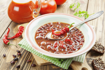 Chili soup with red beans and greens