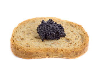 Caviar over piece of toast