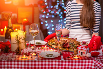 Woman preparing for Christmas dinner
