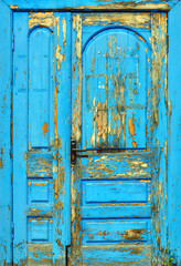 old door painted with blue paint