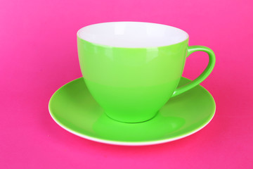 Colorful cup on color background