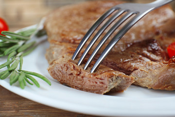 Delicious grilled meat on table, close-up