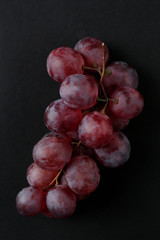 Grape on black background