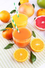 Juices and many citrus close-up