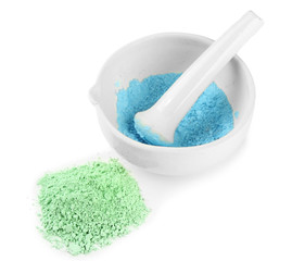 Laboratory pestle in mortar with ground material, isolated