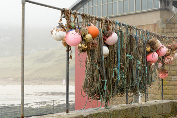 Fishing equipment hanging on rail
