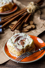 serve Cinnabon rolls with cinnamon and nuts on a plate