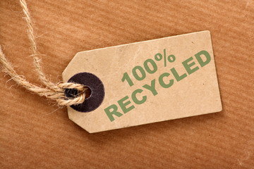 One Hundred Percent Recycled paper luggage tag