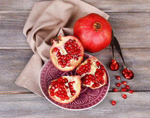 Beautiful composition with juicy  pomegranates,